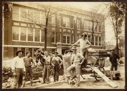 Henry and crew working at Greeley School in Peoria; Henry Sr. at far left, Henry Jr. at far right, c. early 1920s