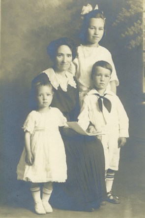 Esther with Ruby, Kenneth and Eileen, c. 1920. Esther had this portrait of her family taken after Arthur died to reassure her parents in England that she was doing fine. 