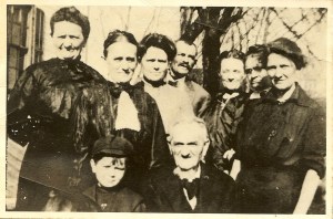 Charles and his children, from left to right: Minnie, Bertie, Josephine, Louis, Lillie, Ida, and Emma. Charles' grandson (Josephine's son) Ellsworth is standing next to him in front (c. 1915).